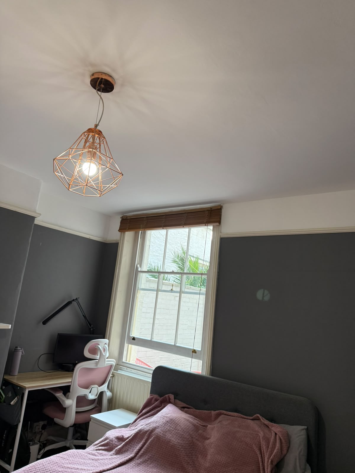 Freshly decorated bedroom with new pendant light fitted